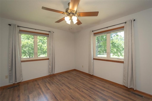 918 King St, Baldwin City, KS 66006 - spare room with wood finished floors and ceiling fan