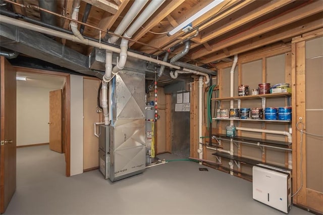 918 King St, Baldwin City, KS 66006 - unfinished below grade area featuring gas water heater and heating unit