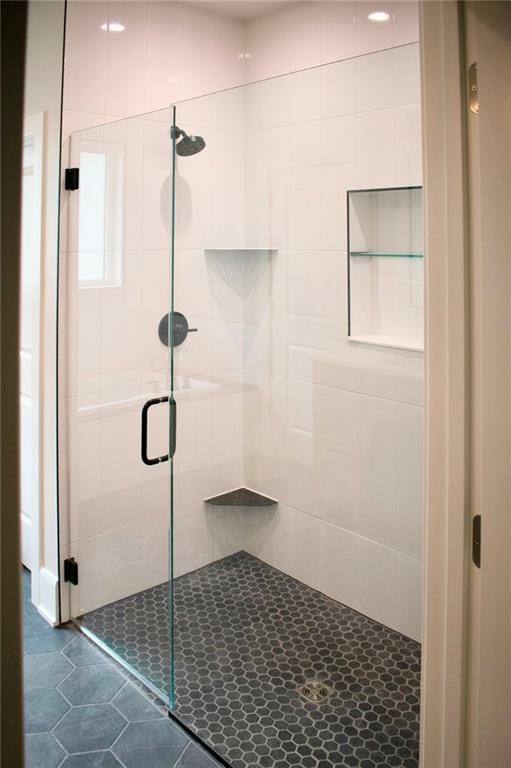 12820 N Arbor Way, Platte City, MO 64079 - bathroom featuring a stall shower and tile patterned floors