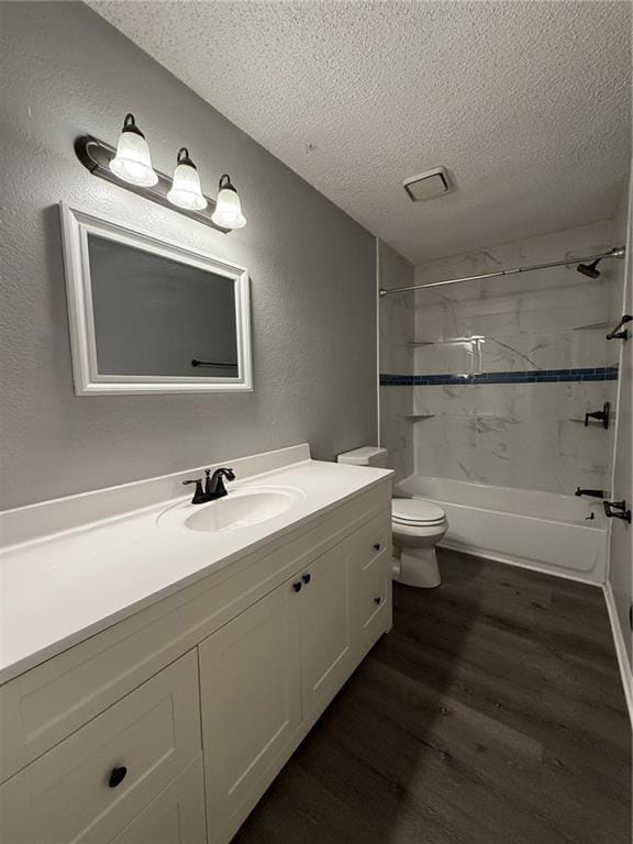 401-07 NE Highland Ln, Blue Springs, MO 64014 - full bath featuring a textured ceiling, wood finished floors, vanity, shower / bathtub combination, and a textured wall