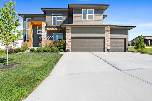 2768 SW 12th Ter, Lees Summit, MO 64081 - prairie-style home with driveway, an attached garage, a front lawn, and stone siding