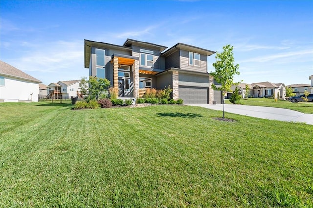 2768 SW 12th Ter, Lees Summit, MO 64081 - view of front of home with an attached garage, concrete driveway, a residential view, and a front lawn