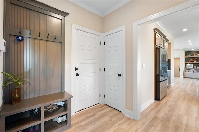 2768 SW 12th Ter, Lees Summit, MO 64081 - mudroom with ornamental molding, light wood finished floors, and recessed lighting