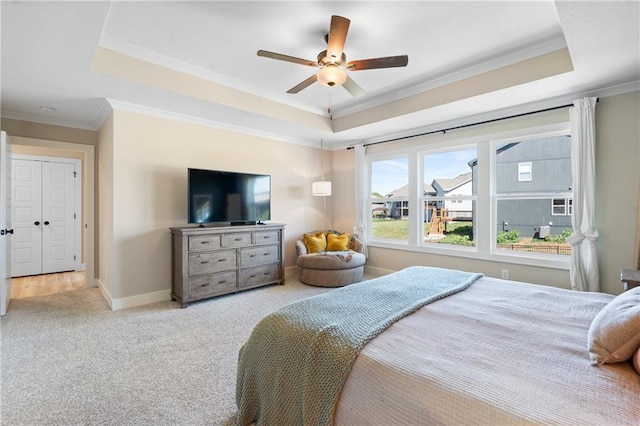2768 SW 12th Ter, Lees Summit, MO 64081 - carpeted bedroom with a raised ceiling, crown molding, and a ceiling fan