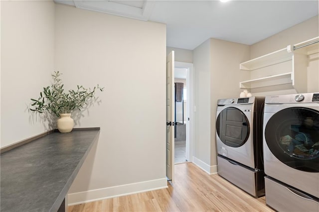 2768 SW 12th Ter, Lees Summit, MO 64081 - laundry room featuring separate washer and dryer and light wood-style floors