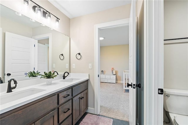 2768 SW 12th Ter, Lees Summit, MO 64081 - bathroom featuring double vanity and toilet