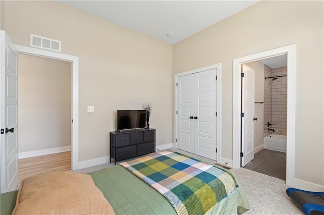 2768 SW 12th Ter, Lees Summit, MO 64081 - bedroom featuring baseboards and ensuite bath