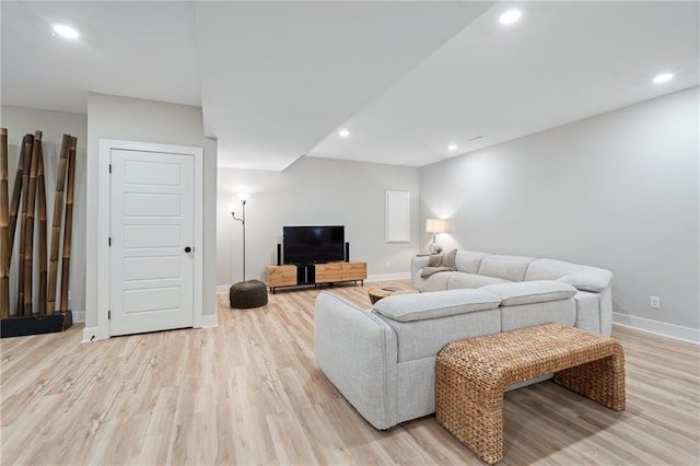 2768 SW 12th Ter, Lees Summit, MO 64081 - living area featuring light wood finished floors and recessed lighting