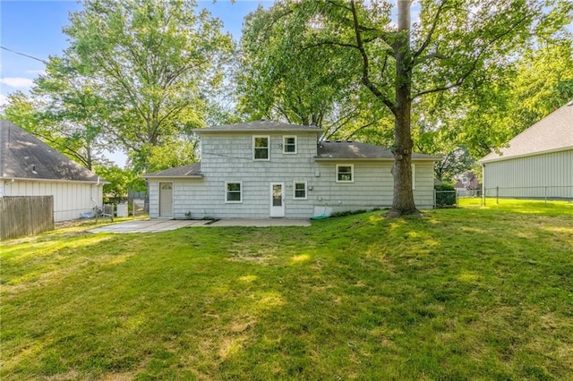 9909 Juniper Ln, Overland Park, KS 66207 - back of house with a patio