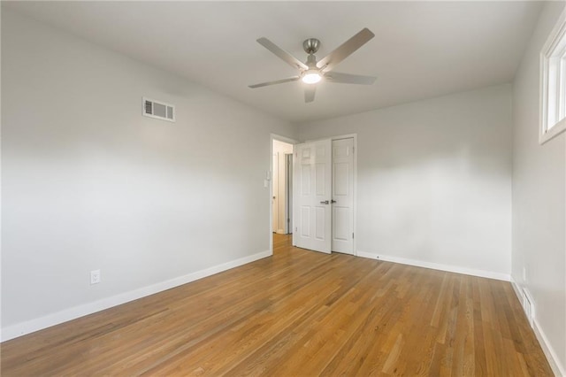 9909 Juniper Ln, Overland Park, KS 66207 - unfurnished room with ceiling fan and light wood-type flooring