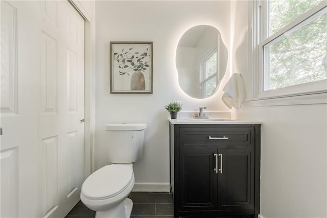 9909 Juniper Ln, Overland Park, KS 66207 - half bath with vanity and tile patterned flooring