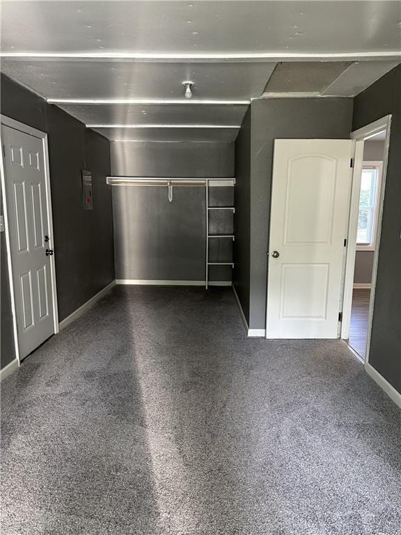 11001 Ewing Ave, Kansas City, MO 64134 - garage featuring baseboards
