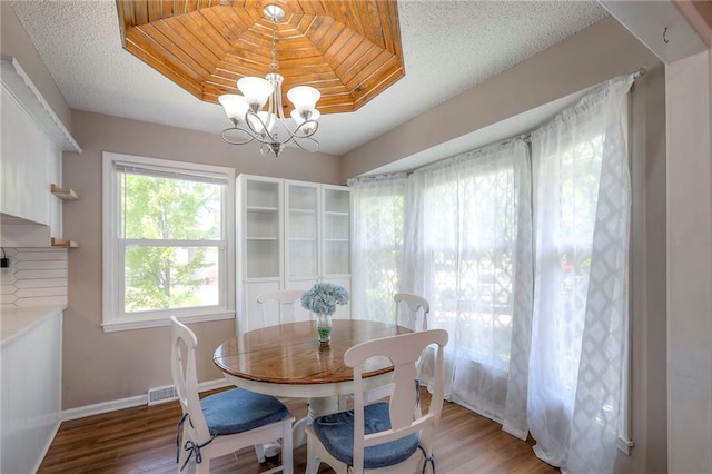 1921 SW 4th St, Lees Summit, MO 64081 - dining area featuring light wood-style floors and a chandelier