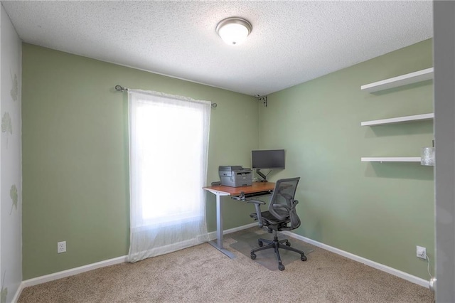 1921 SW 4th St, Lees Summit, MO 64081 - office area featuring healthy amount of natural light, carpet flooring, and a textured ceiling