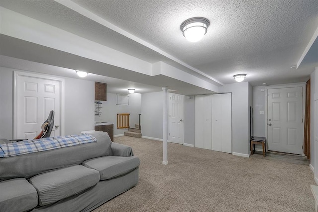 1921 SW 4th St, Lees Summit, MO 64081 - living room featuring a textured ceiling and light carpet