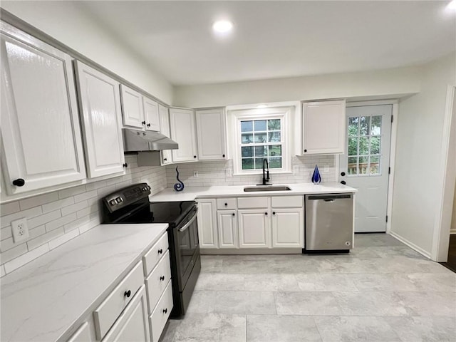 10806 W 96th St, Overland Park, KS 66214 - kitchen featuring dishwasher, black / electric stove, under cabinet range hood, tasteful backsplash, and white cabinetry