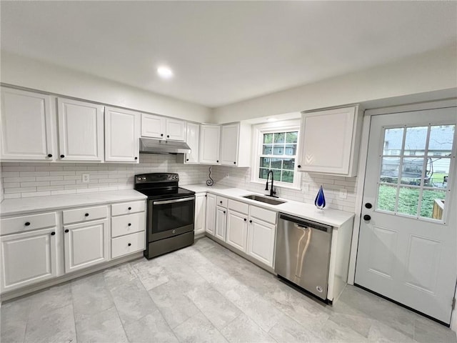 10806 W 96th St, Overland Park, KS 66214 - kitchen featuring stainless steel dishwasher, range with electric stovetop, under cabinet range hood, tasteful backsplash, and light countertops