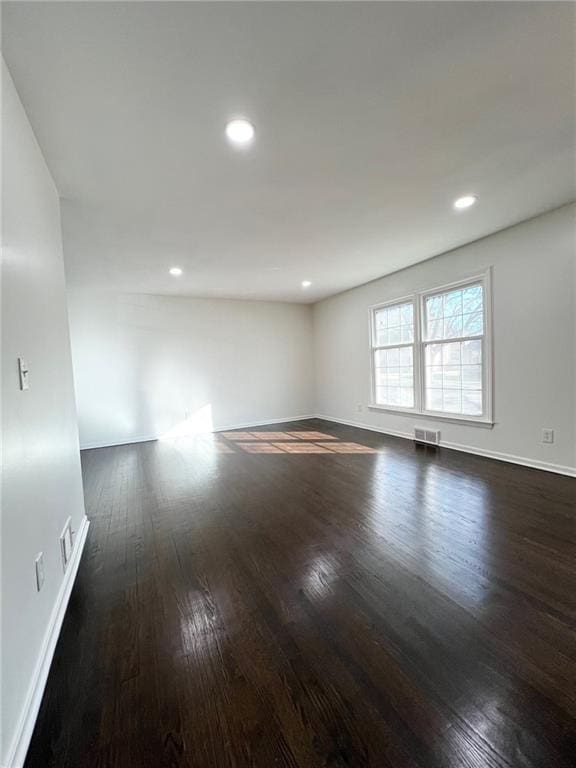 10806 W 96th St, Overland Park, KS 66214 - empty room featuring dark wood-style flooring and recessed lighting
