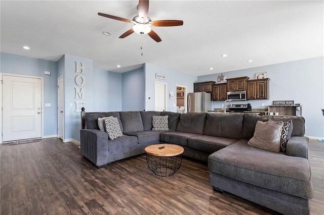 21904 Crystal Ave, Peculiar, MO 64078 - living area with dark wood-type flooring, ceiling fan, and recessed lighting