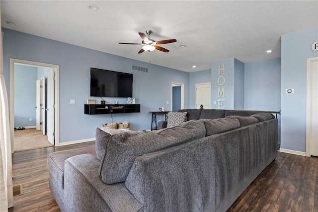 21904 Crystal Ave, Peculiar, MO 64078 - living area featuring dark wood finished floors, a ceiling fan, and recessed lighting