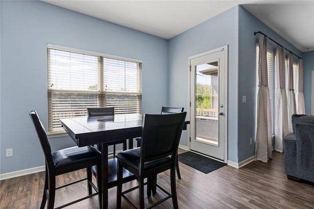 21904 Crystal Ave, Peculiar, MO 64078 - dining room with baseboards and wood finished floors