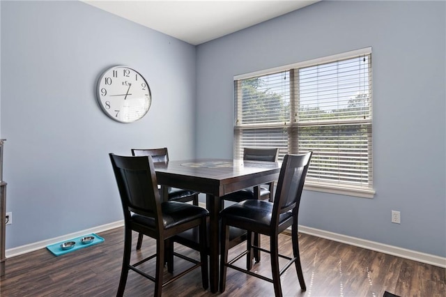21904 Crystal Ave, Peculiar, MO 64078 - dining space with healthy amount of natural light and dark wood-style floors