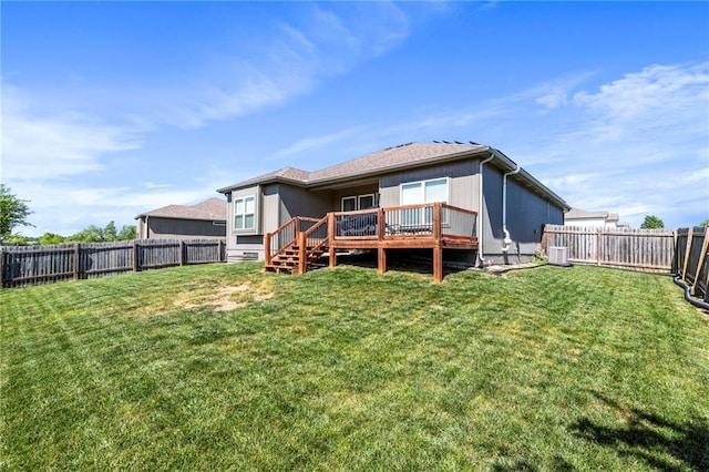 21904 Crystal Ave, Peculiar, MO 64078 - rear view of house with a fenced backyard and a wooden deck