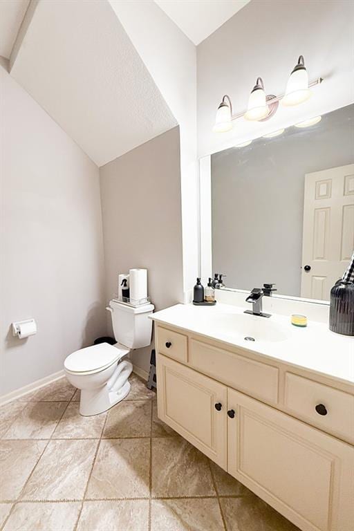 12748 Walker Ave, Kansas City, KS 66109 - half bathroom featuring vanity and tile patterned floors