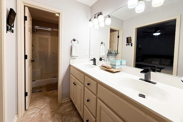 12748 Walker Ave, Kansas City, KS 66109 - ensuite bathroom with double vanity, a shower stall, and tile patterned flooring