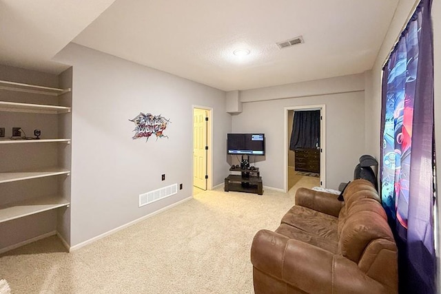 12748 Walker Ave, Kansas City, KS 66109 - living area featuring carpet floors and baseboards
