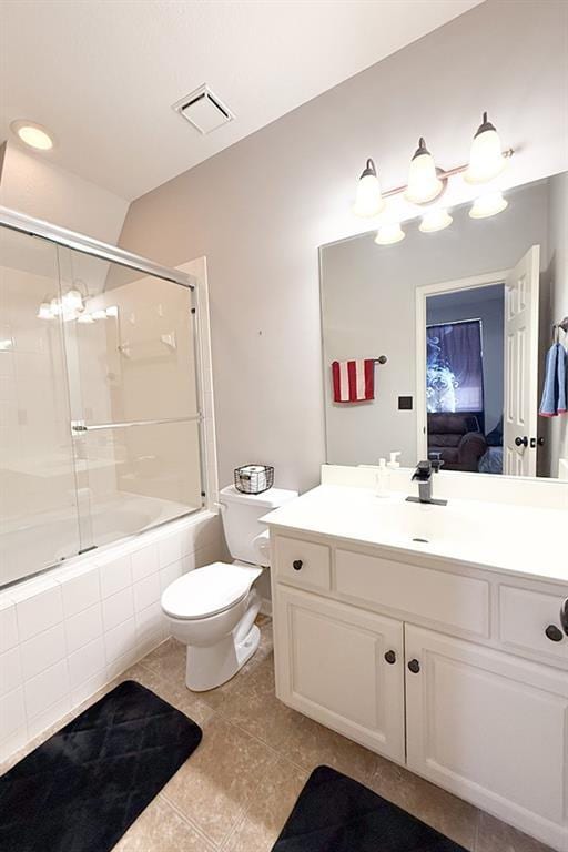 12748 Walker Ave, Kansas City, KS 66109 - bathroom with tile patterned flooring, combined bath / shower with glass door, and vanity