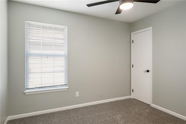 1304 E 41st St, Kansas City, MO 64110 - spare room with ceiling fan and carpet flooring