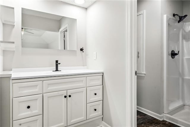16620 E 36th St, Independence, MO 64055 - full bath featuring walk in shower, vanity, and a ceiling fan