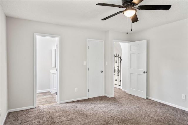 16620 E 36th St, Independence, MO 64055 - unfurnished bedroom with carpet, ensuite bath, and ceiling fan