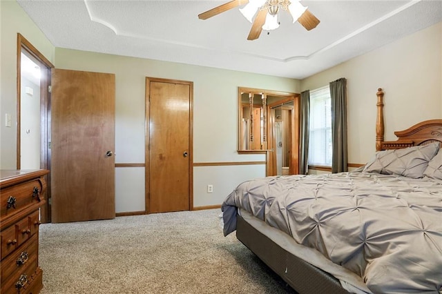 503 SE Brownfield Dr, Lees Summit, MO 64063 - bedroom with carpet floors and ceiling fan