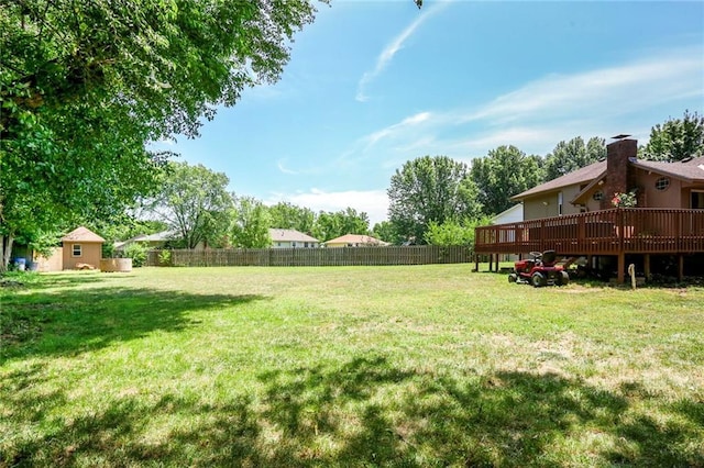 503 SE Brownfield Dr, Lees Summit, MO 64063 - view of yard featuring a deck
