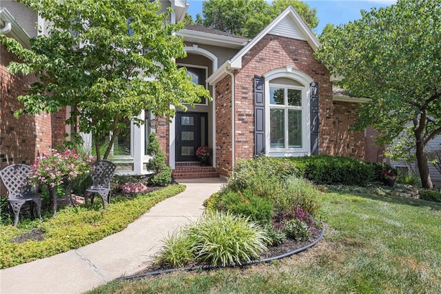 4140 W 131st Ter, Leawood, KS 66209 - view of front of home featuring brick siding and a front yard