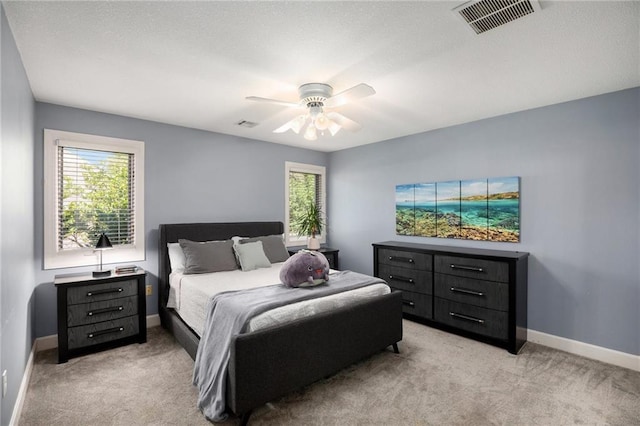 4140 W 131st Ter, Leawood, KS 66209 - bedroom featuring light colored carpet and a ceiling fan