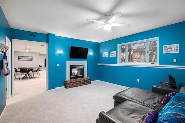 4140 W 131st Ter, Leawood, KS 66209 - carpeted living area with a ceiling fan and a brick fireplace