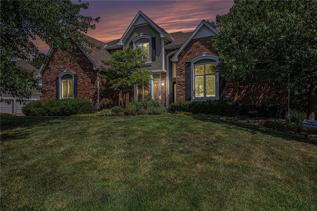 4140 W 131st Ter, Leawood, KS 66209 - traditional home featuring a lawn and brick siding
