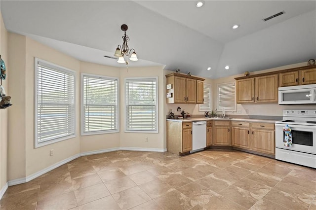 21506 Murlo Cir, Peculiar, MO 64078 - kitchen with white appliances, light countertops, lofted ceiling, decorative light fixtures, and a chandelier