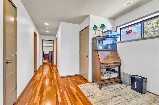 2400 Forest Ave, Kansas City, MO 64108 - hallway featuring light wood-type flooring and recessed lighting