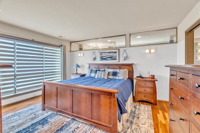 2400 Forest Ave, Kansas City, MO 64108 - bedroom with light wood-style floors
