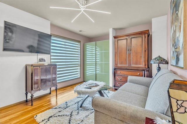 2400 Forest Ave, Kansas City, MO 64108 - living room featuring light wood-style floors