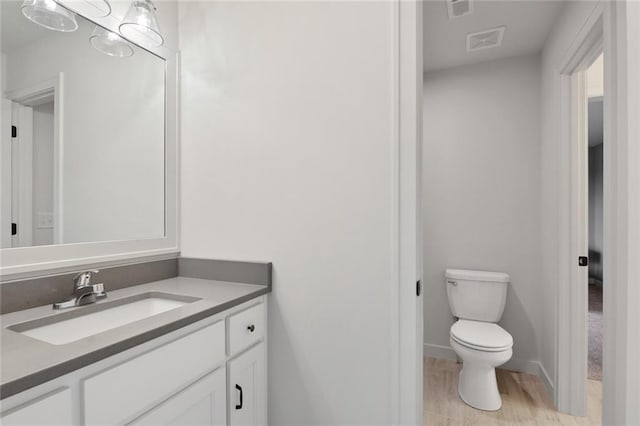 18608 Mohawk Ln, Overland Park, KS 66085 - bathroom featuring toilet and vanity