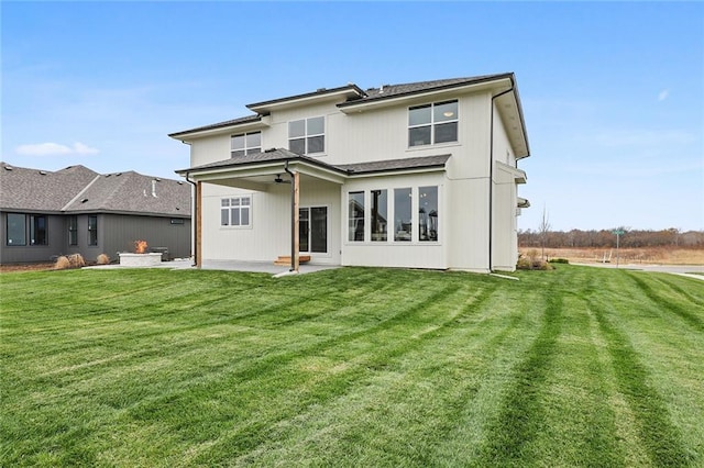 18608 Mohawk Ln, Overland Park, KS 66085 - rear view of house featuring a patio area and a yard