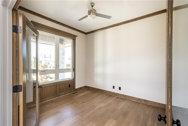 3361 W 187th St, Overland Park, KS 66085 - empty room with wood finished floors, ornamental molding, and a ceiling fan