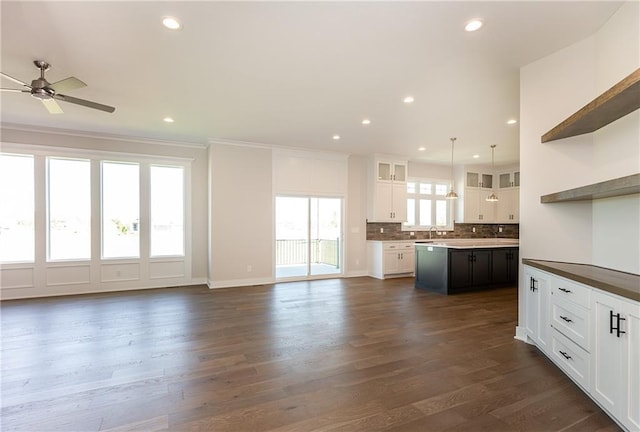 3361 W 187th St, Overland Park, KS 66085 - kitchen featuring open shelves, open floor plan, a center island, ceiling fan, and backsplash