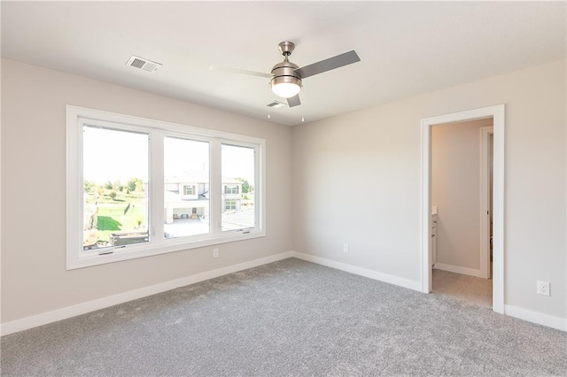 3361 W 187th St, Overland Park, KS 66085 - spare room featuring light carpet and a ceiling fan