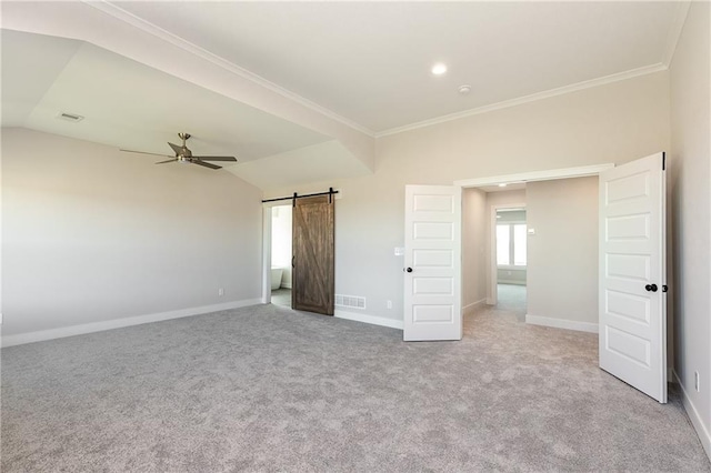 3361 W 187th St, Overland Park, KS 66085 - unfurnished bedroom featuring a barn door, light colored carpet, ornamental molding, a ceiling fan, and recessed lighting